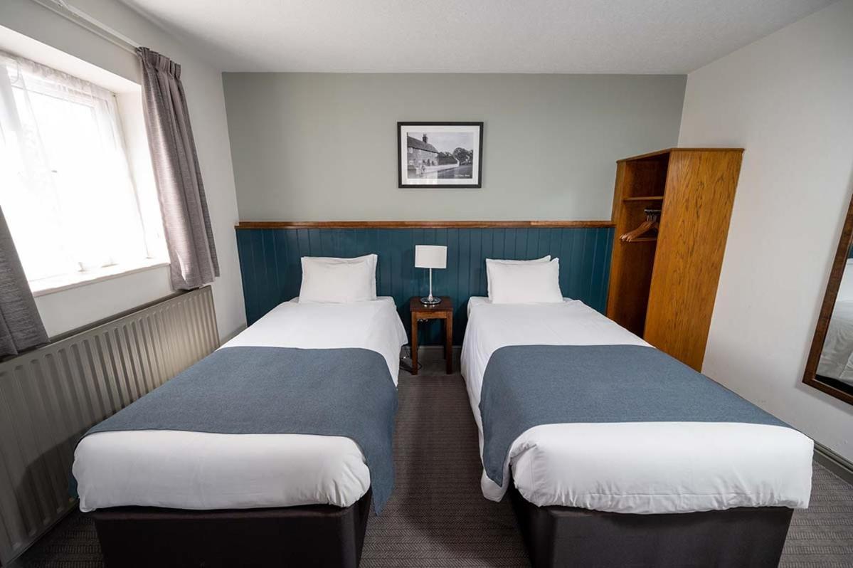 Cocked By Greene King Hotel
